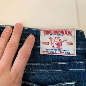Size small 27 fit blue true religion jeans. The button is a snap button.